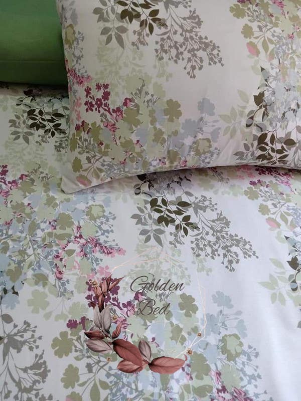 Printed bed sheet set with 2 pillowcases of the same pattern and a long plain green pillow, 260 * 240, four pieces - multi-colored