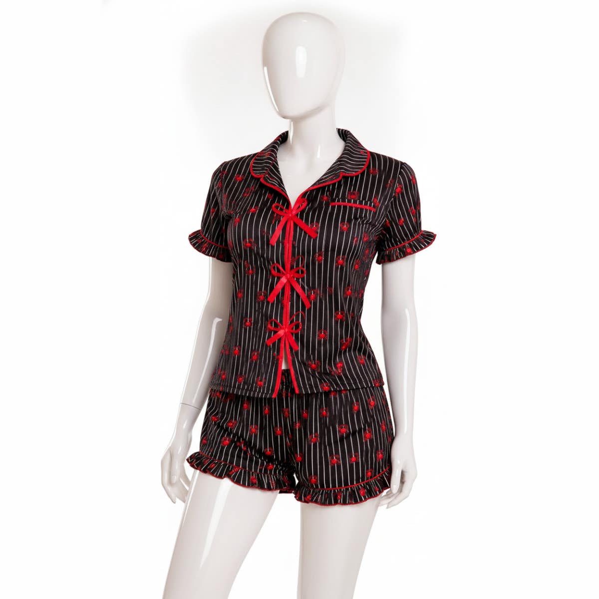 Women's two-piece pajama set with a with a collar and bows on the front