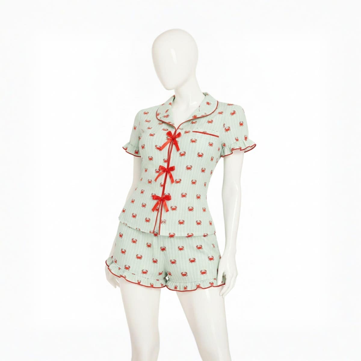 Women's two-piece pajama set with a with a collar and bows on the front