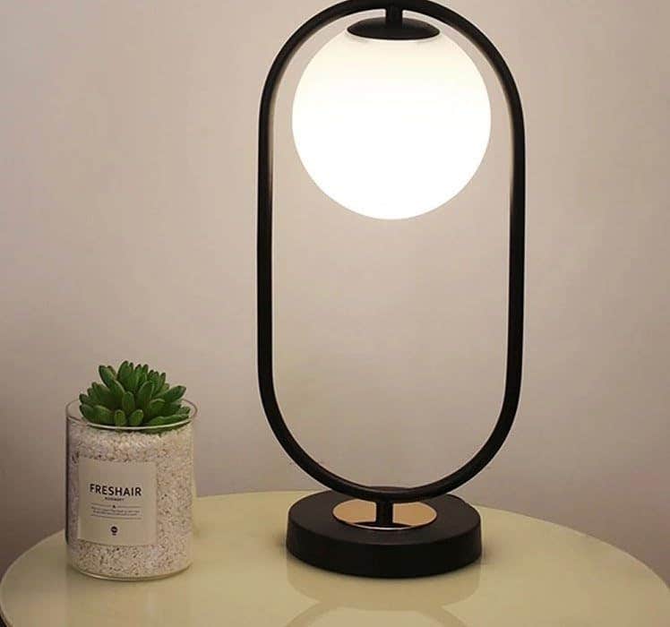 Mushkah Lighting Modern Table Lamp with Round Frame and Globe Cover__ Oval__ Black__