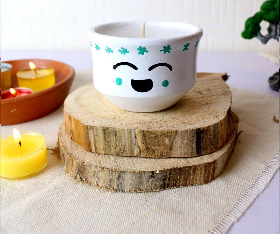 Handcrafted Ceramic Candle in Cute Emoji Face Design, White with Green Floral Pattern, Home Decor